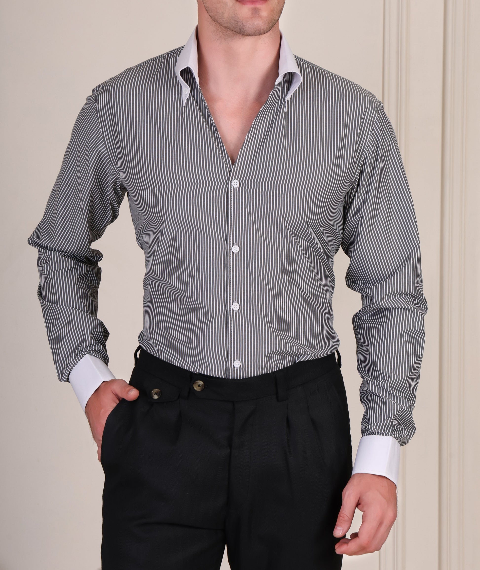 Black and white pinstripe cotton viscose shirt with white contrast collar and cuffs for men by Italian Vega®, styled with black trousers.